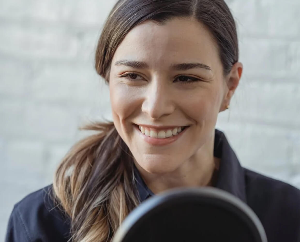 A woman smiling